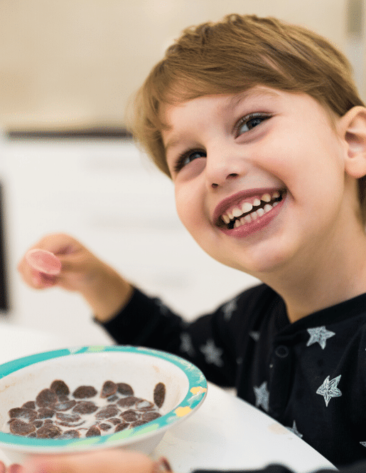 Little Boy Eating Ready To Eat Cereal